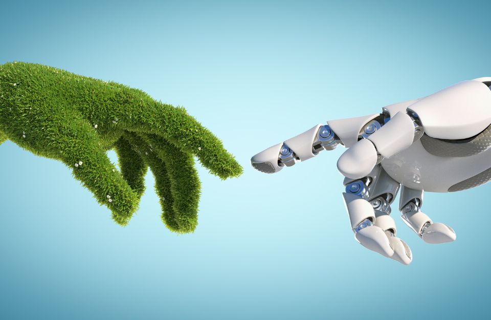 a green and a robot finger touching